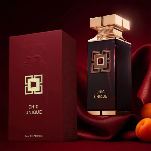 Chic Unique perfume bottle and packaging on a dark background