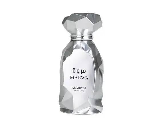 Perfume bottle with geometric design on a white background