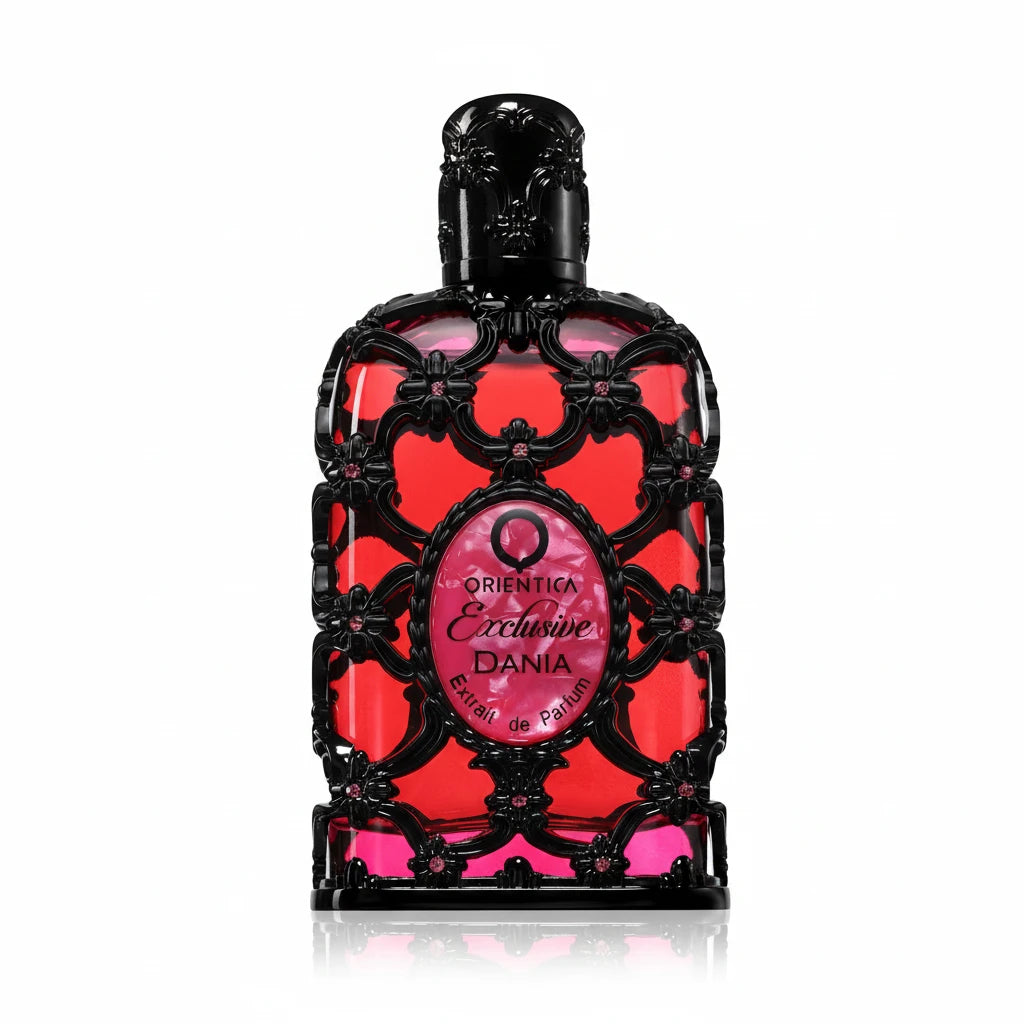 Decorative perfume bottle with pink and black design on a white background